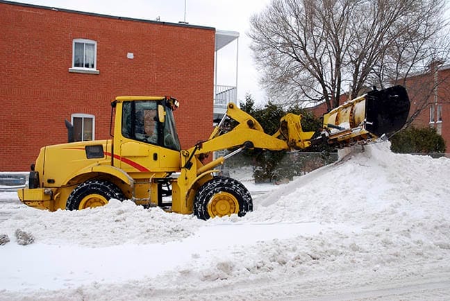 Perks of taking snow plows for commercial buildings